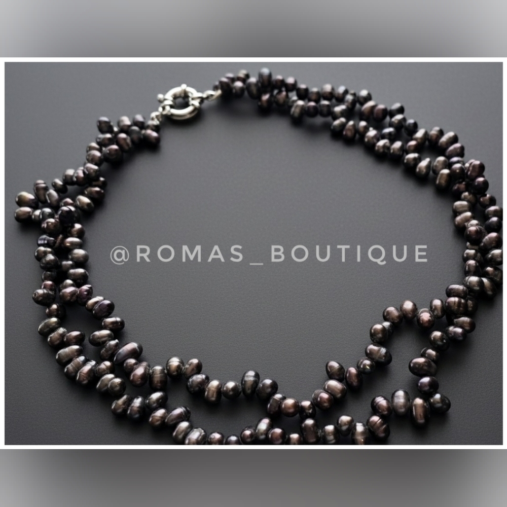 Real pearl double strand necklace with silver tone clasp